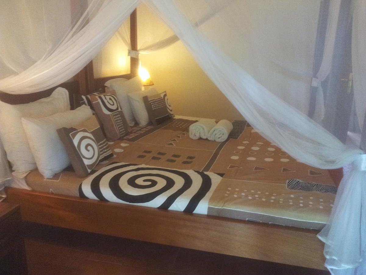 Airport Guesthouse Энтеббе Экстерьер фото