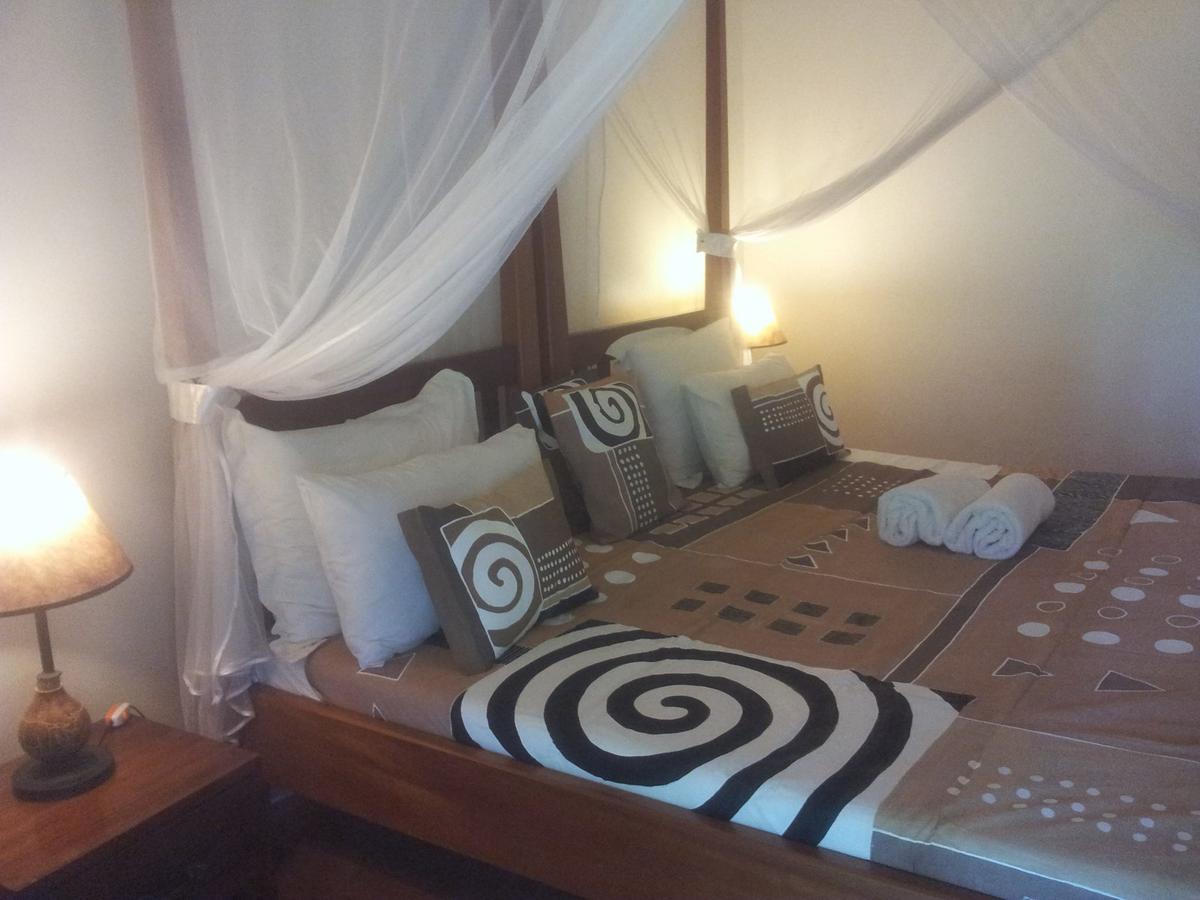 Airport Guesthouse Энтеббе Экстерьер фото