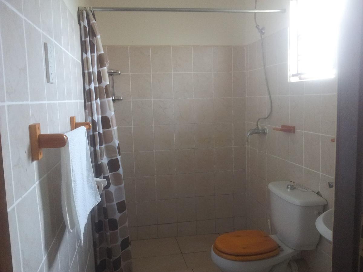 Airport Guesthouse Энтеббе Экстерьер фото
